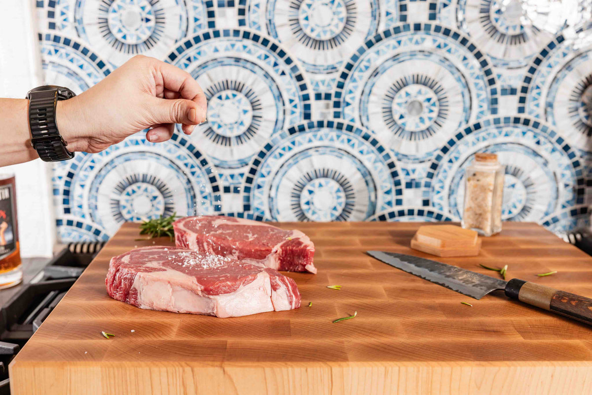  Close-up of a handcrafted Maple End Grain Cutting Board by The Boardsmith showcasing rich wood grain.